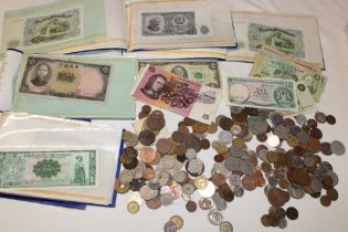 Various folders of Rothmans rare Foreign banknotes and a selection of mixed Foreign coins