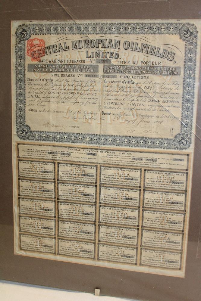 A Central European Oil Fields Limited share bond in display frame dated 1909