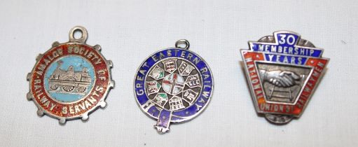 A National Union of Railwaymen silver lapel badge,