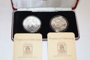 A pair of Malaysia silver 15/25 ringgit coins,