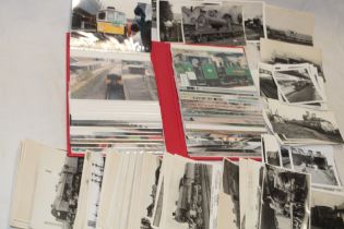 A selection of approximately 90 various black and white and coloured postcards - railway including