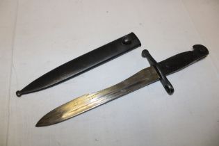A Spanish Bolo bayonet with single-edged blade in steel scabbard,