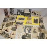 A selection of various military photographs, postcards, Naval postcards,