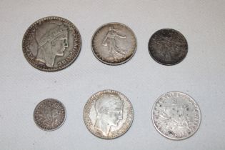 A small selection of French silver coins including 1933 20 franc