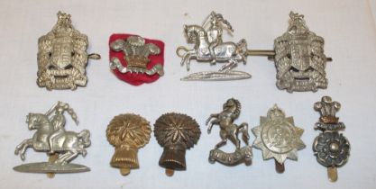 Ten various Yeomanry military cap badges including Royal Wiltshire Yeomanry, King Edward's Horse,