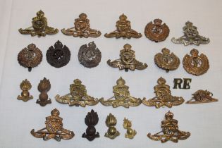 A selection of various Royal Artillery cap badges including Territorial Artillery,