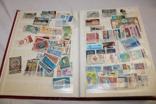 A stock book containing British Commonwealth stamps including Jamaica,