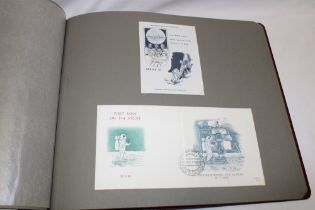 An album containing a collection of 1969 First Day covers commemorating the first moon landing