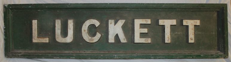 An old and original wooden Cornish railway station sign "Luckett" with raised lettering,