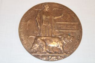 A First War Bronze Memorial plaque awarded to Arthur Leonard Richardon (No. 24209 4th Bn.