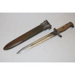 A United States bayonet with single edged blade marked "A.F.H.