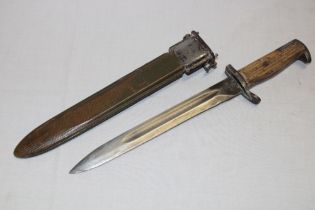 A United States bayonet with single edged blade marked "A.F.H.