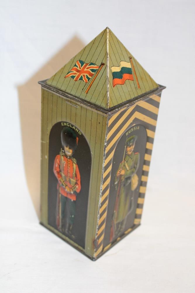 A rare First War Huntley & Palmers sentry box biscuit tin depicting soldiers from England, Russia,