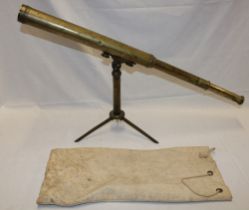 A George III brass two-draw library telescope by Proctor & Beilby,