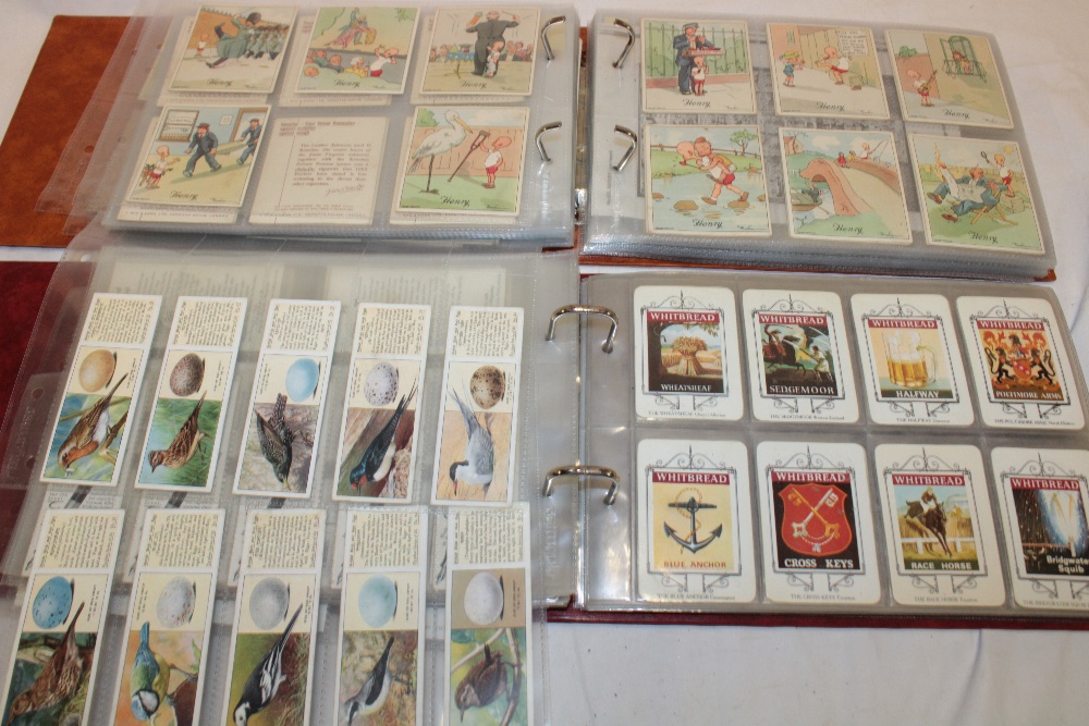 An album containing a collection of Henry cigar cards together with an album of Grande cigar cards - Image 2 of 2