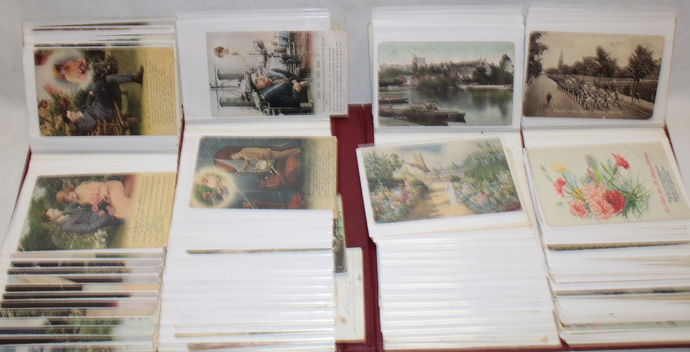 An album containing a selection of various postcards including First War military greetings