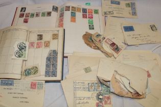 Two old albums containing a selection of mixed World stamps including numerous 19th century