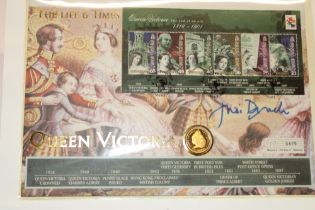A Life and Times of Queen Victoria coin cover inset with a 2001 gold sovereign