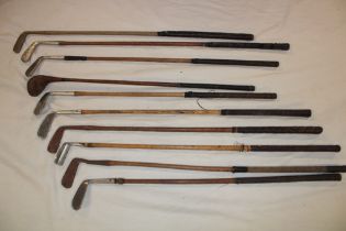 Ten various old hickory shafted golf clubs including mashie iron by J McAndrew of Glasgow,