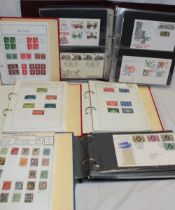 Six folder albums containing a collection of GB stamps,