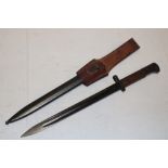 A Czech bayonet with blackened single-edged blade marked "CSZ1" in steel scabbard with leather frog