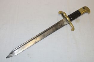 An 1855 pattern Lancaster sword bayonet with shortened 11½" blade and brass mounted hilt