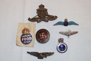 A small selection of various badges including National War Savings Committee lapel badge,