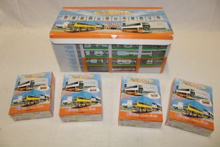 A set of twelve mint and boxed Hong Kong city bus diecast vehicles in original outer packaging