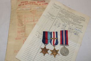 A 1939/45 star, France and Germany star with Atlantic bar and a 1939-45 War medal awarded to L.H.T.