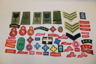 A selection of various cloth Cadet Forces insignia including "Cornwall Cdt. Bn. L.I.