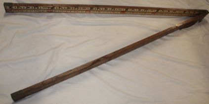 A Mine Surveyor's old mahogany twin-section folding surveying staff by Hilger & Watts Ltd.