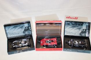 Three GMP mint and boxed Formula 1 racing cars including 1966 Lola, McClaren M8B low wing,