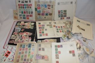A large selection of mixed World stamps in albums, packets etc.