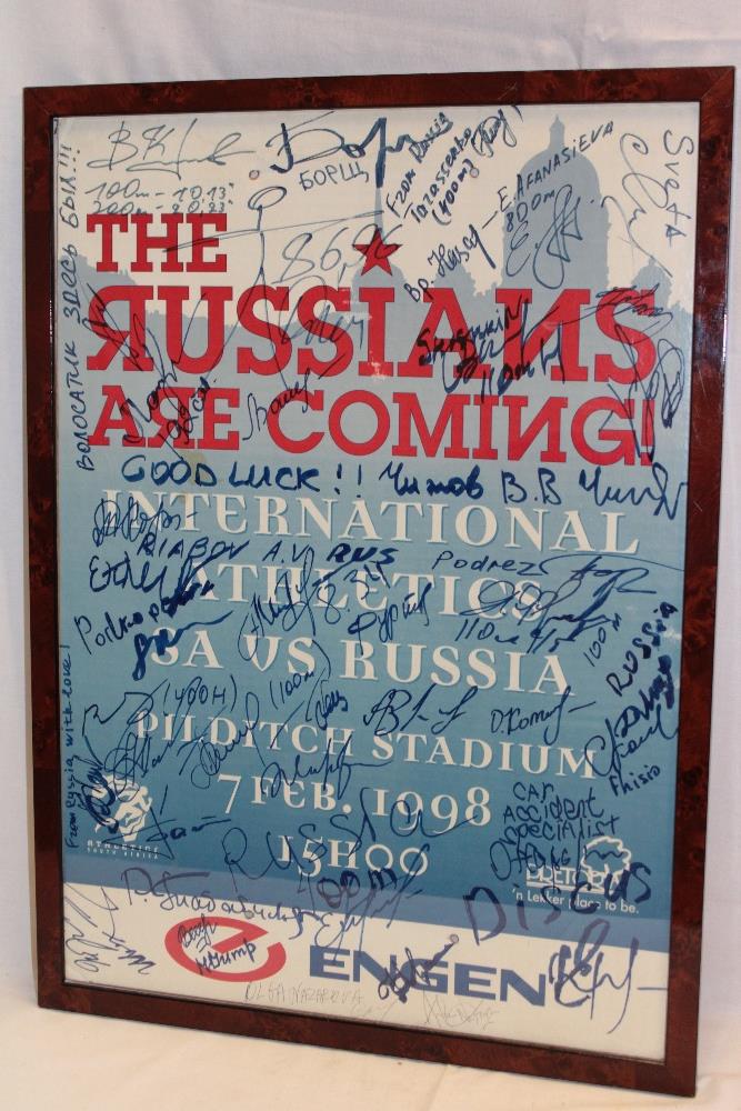 A 1998 International Athletics poster "The Russian's Are Coming!" bearing numerous signatures,