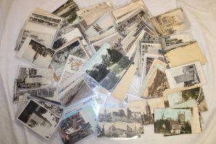 A large selection of various black and white and coloured postcards, Cornish scenes,