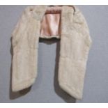 A blonde mink cape