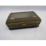 A jewellery casket with bevelled lass lid and gilt edge beading