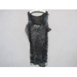 A 1920 black net and sequins flapper dress for restoration, some sequins have an iridescent beetle-