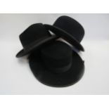 A black bowler hat, Homberg and a Mallorcan sombrero, spat and gloves, etc