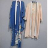 Two early to mid-20th Century kimono style dressing gowns, peach cotton with hand embroidered floral