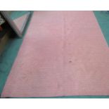 A jute and coral wool diamond pattern rug, 230cm x 164cm approx.