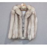 A silver fox fur jacket