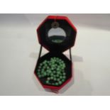 A jade bead necklace