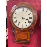 A 19th Century drop dial wall clock, walnut cased with Roman numerals, face paint flaking, with