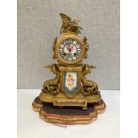 A 19th Century ormolu and Sevres style panel figural mantel clock with merman style mounts, on