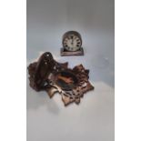 A 19th Century fretwork miniature wall bracket with base metal travel clock, glass loose