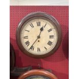 An early 20th Century oak cased dial clock with painted tin Roman dial, with pendulum