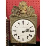 A French comtoise clock by A Borredon, the enamel Roman dial with brass fretwork top case, on