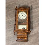 A Victorian Tunbridge style drop dial wall clock with blind fret detail, Roman numerated painted,
