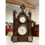 A Knight & Son of Northampton Gothic clock with barometer dial, stepped base, architectural form,